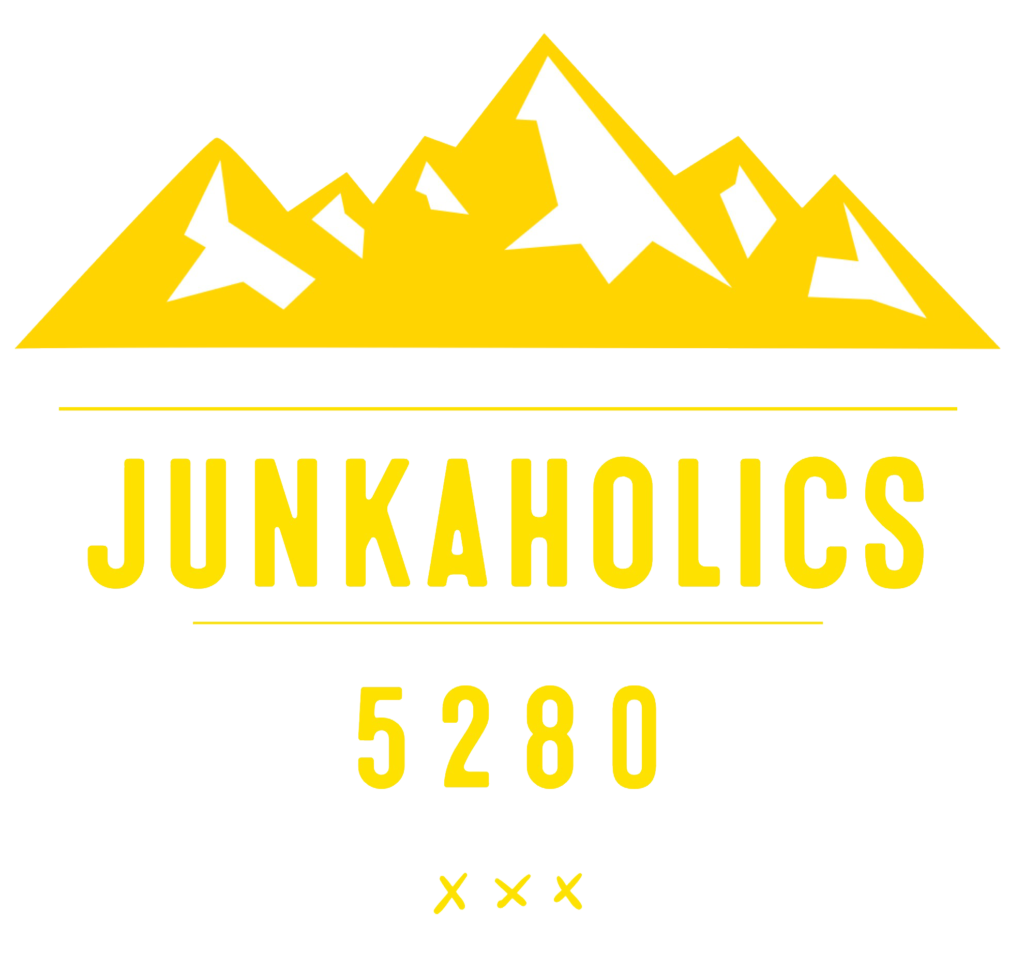 yellow Junkaholics logo of mountains with their name and 5280 underneath